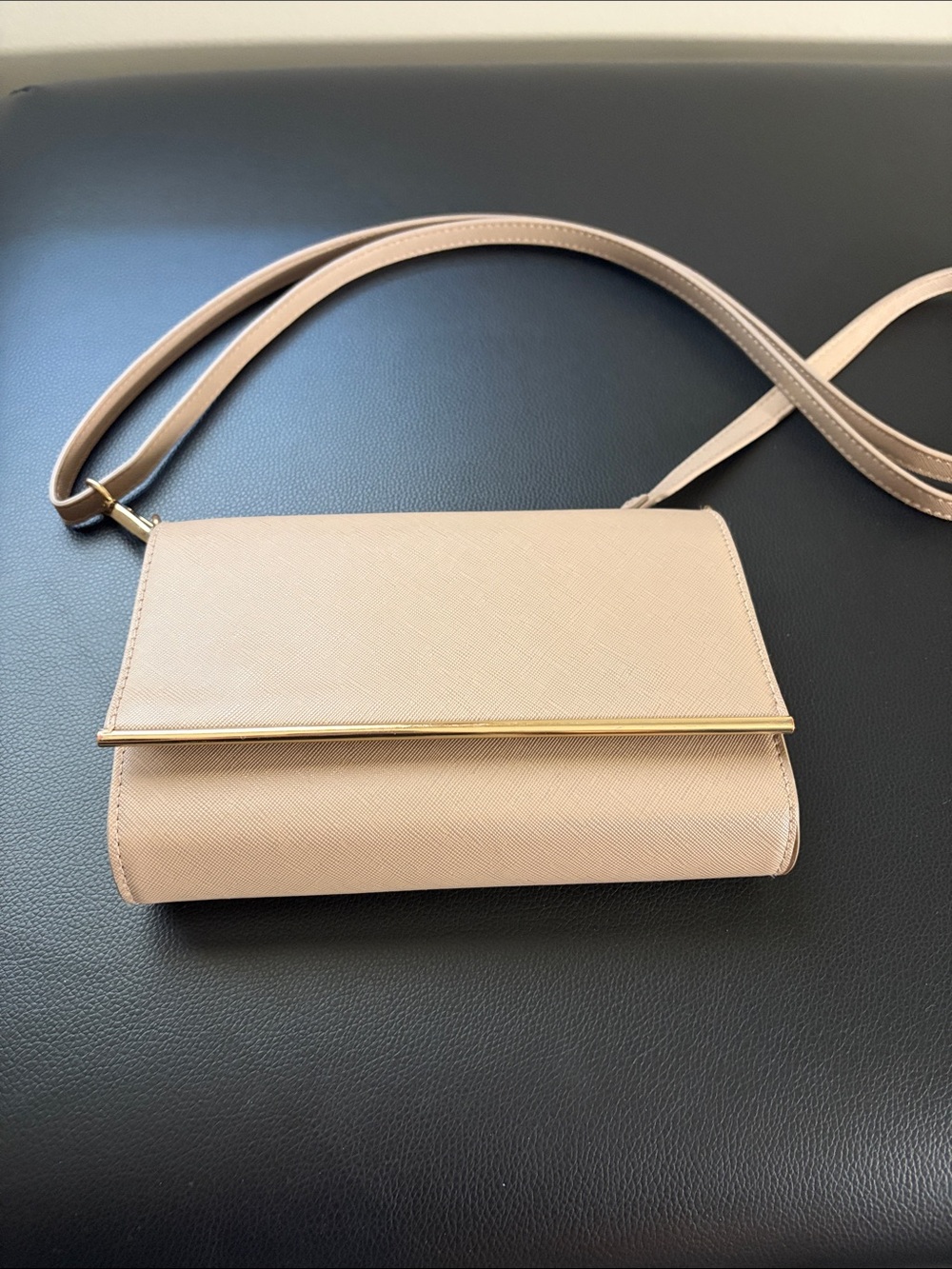 Sleek Neutral Crossbody Bag with Gold Accent